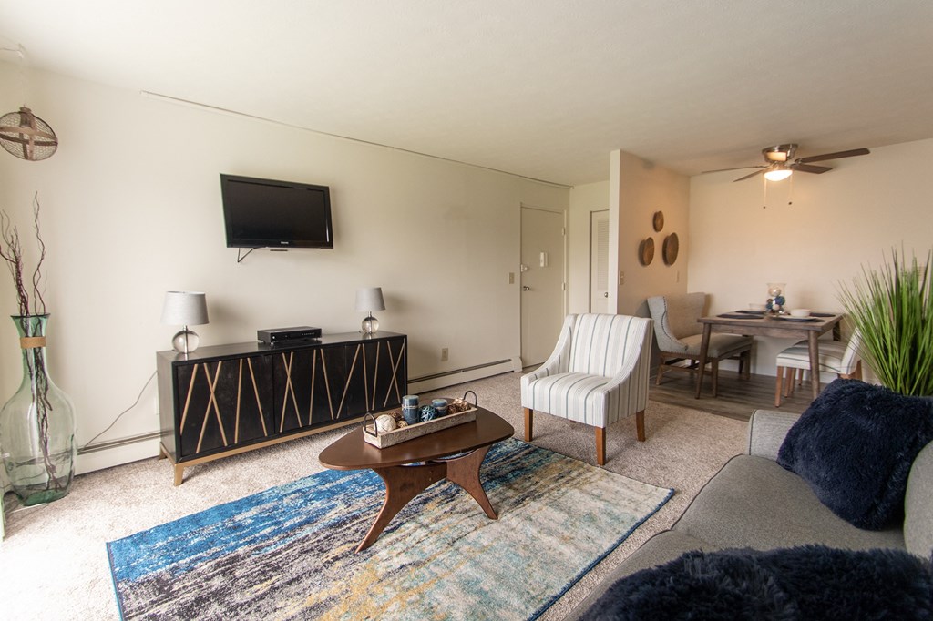 This is a photo of the living room and dining area in the 705 square foot 2 bedroom, 1 bath apartment at Lisa Ridge Apartments in the Westwood neighborhood of Cincinnati, Ohio.