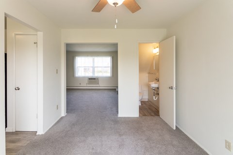 This is a photo of the dining room in the 1004 square foot, 2 bedroom, 1.5 bath townhome floor plan at Lake of the Woods Apartments in Cincinnati, OH.