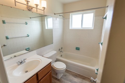This is a photo of the bathroom in the 1004 square foot, 2 bedroom, 1.5 bath townhome floor plan at Lake of the Woods Apartments in Cincinnati, OH.