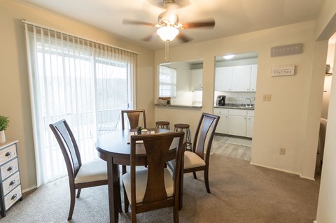 This is a photo of the dining room of the 1 bedroom, 631 square foot model apartment at Lake of the Woods Apartments in Cincinnati, OH.
