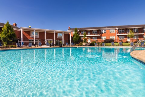 Sparkling community swimming pool at Lake of the Woods Apartments in Mount Healthy, Ohio