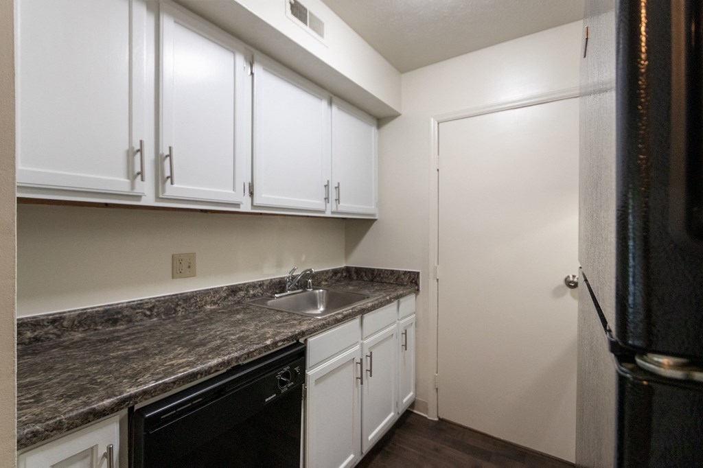 This is a photo the kitchen of the 1030 square foot, Oak 2 bedroom, 1 bath apartment at Montana Valley Apartments in the Westwood neighborhood of Cincinnati, OH.