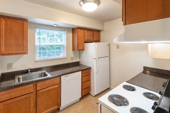 This is a photo the kitchen of the 851 square foot, Maple 2 bedroom, 1 bath apartment at Montana Valley Apartments in the Westwood neighborhood of Cincinnati, OH. - Photo Gallery 3