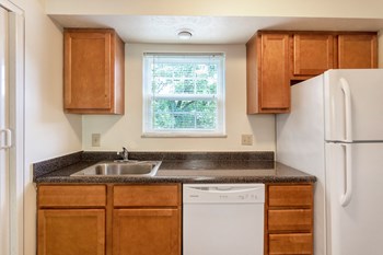 This is a photo the kitchen of the 851 square foot, Maple 2 bedroom, 1 bath apartment at Montana Valley Apartments in the Westwood neighborhood of Cincinnati, OH. - Photo Gallery 4