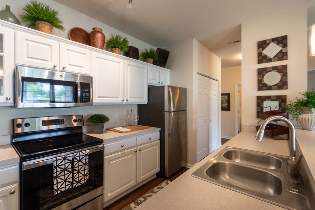 This is a photo of the kitchen in the 2 bedroom, 2 bath Islander floor plan at Nantucket Apartments in Loveland, OH.