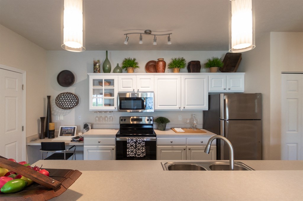 This is a photo of the kitchen in the 2 bedroom, 2 bath Islander floor plan at Nantucket Apartments in Loveland, OH.