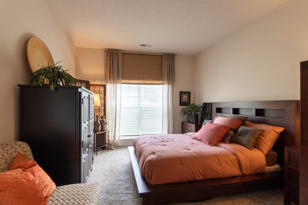 This is a photo of the primary bedroom in the 2 bedroom, 2 bath Islander floor plan at Nantucket Apartments in Loveland, OH.