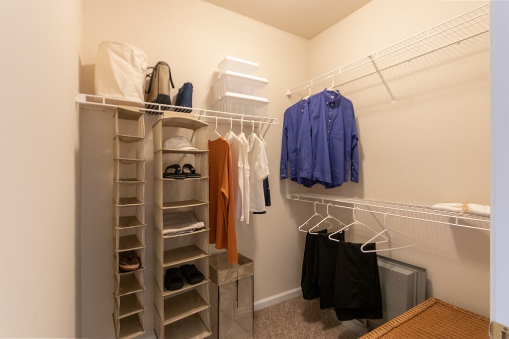 This is a photo of the second bedroom walk-in closet in the 2 bedroom, 2 bath Islander floor plan at Nantucket Apartments in Loveland, OH.