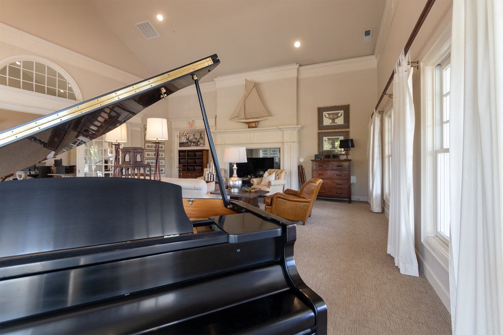 This is a photo of the clubhouse piano room at Nantucket Apartments in Loveland, Ohio.