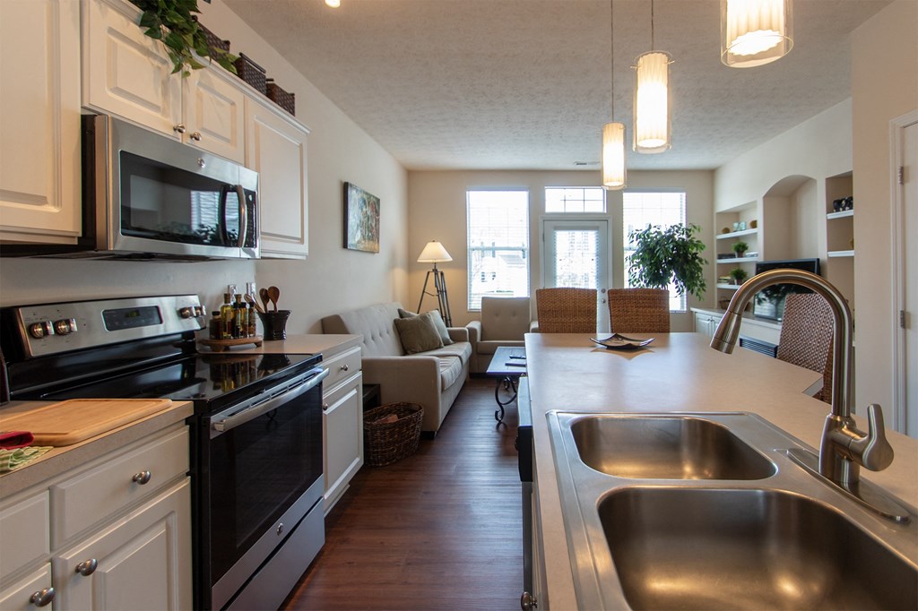 This is a photo of the kitchen in the 1242 square foot, 2 bedroom, 2 and 1/2 bath Spinnaker floor plan at Nantucket Apartments in Loveland, OH.