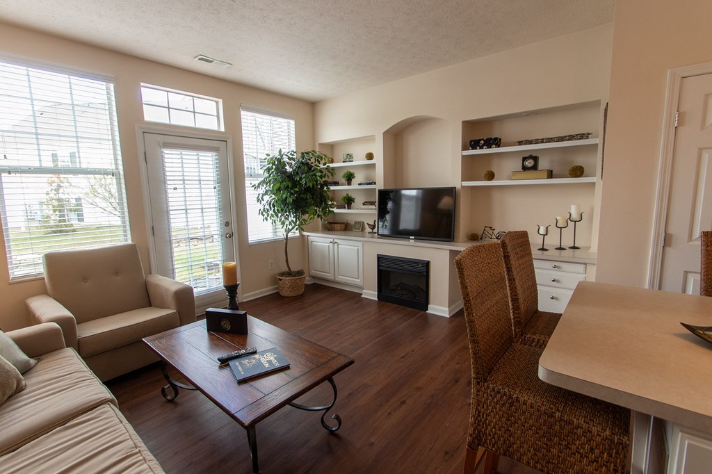 This is a photo of the living room in the 1242 square foot, 2 bedroom, 2 and 1/2 bath Spinnaker floor plan at Nantucket Apartments in Loveland, OH.