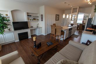 This is a photo of the living room in the 1242 square foot, 2 bedroom, 2 and 1/2 bath Spinnaker floor plan at Nantucket Apartments in Loveland, OH.