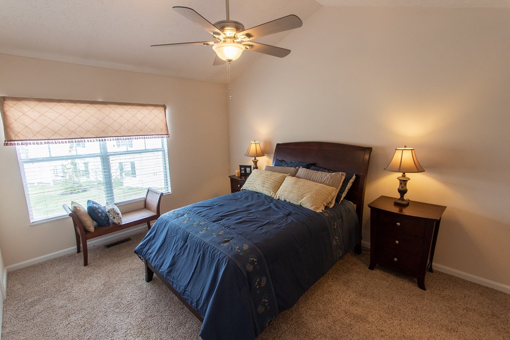 This is a photo of the primary bedroom in the 1242 square foot, 2 bedroom, 2 and 1/2 bath Spinnaker floor plan at Nantucket Apartments in Loveland, OH.
