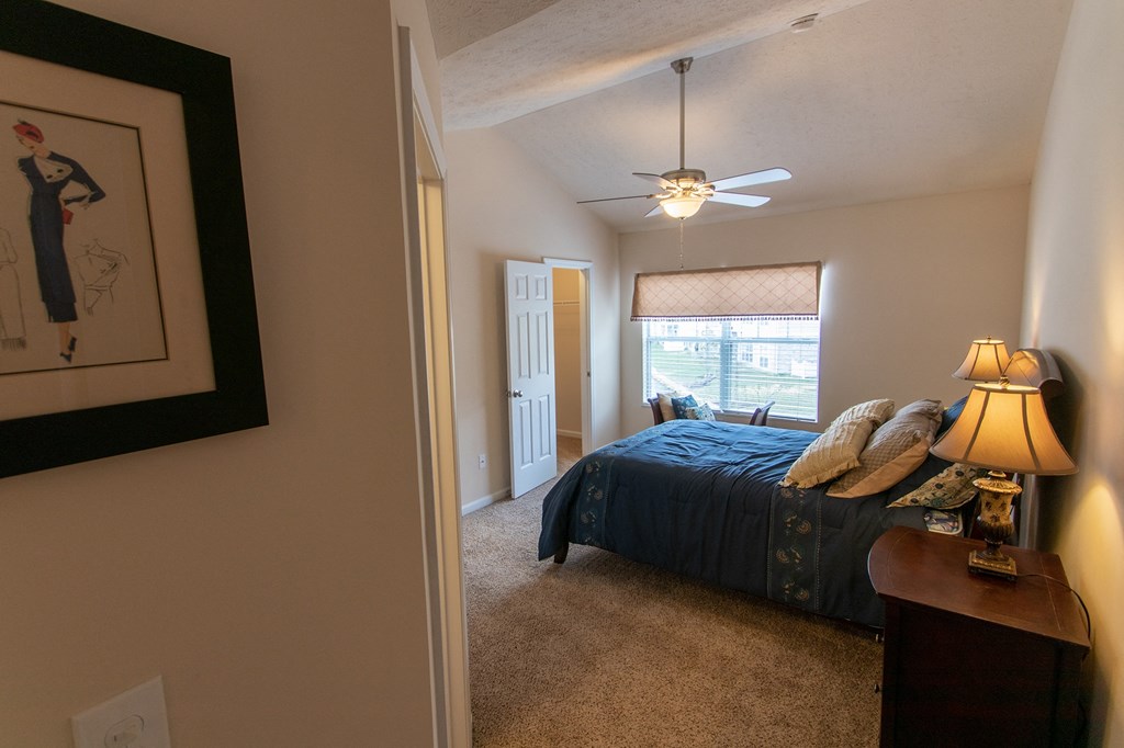 This is a photo of the primary bedroom in the 1242 square foot, 2 bedroom, 2 and 1/2 bath Spinnaker floor plan at Nantucket Apartments in Loveland, OH.
