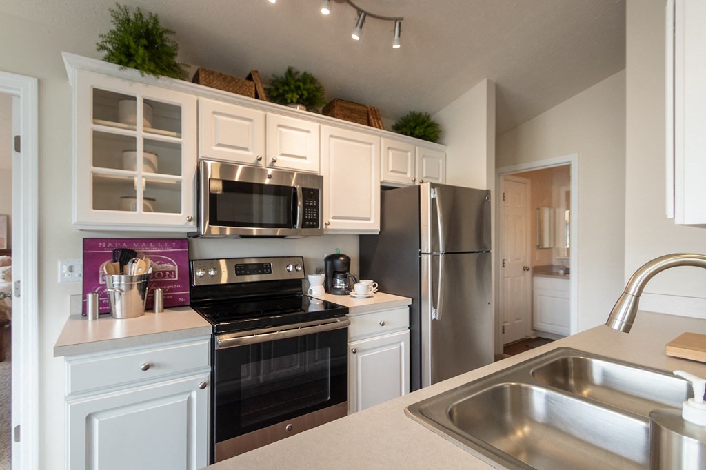 This is a photo of the kitchen in the 1016 square foot, 2 bedroom, 2 bath Nautica floor plan at Nantucket Apartments in Loveland, OH.