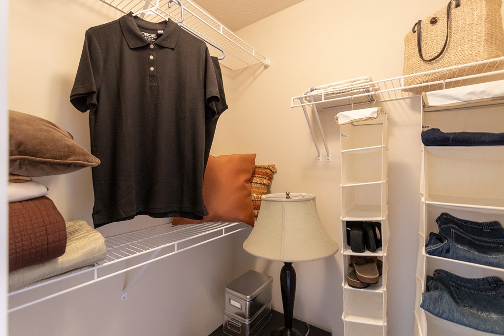 This is a photo of the second bedroom walk-in closet  in the 1016 square foot, 2 bedroom, 2 bath Nautica floor plan at Nantucket Apartments in Loveland, OH.