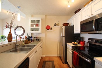 The Clipper This is a photo of the kitchen in the 1 bedroom Clipper floor plan at Nantucket Apartments in Loveland, OH. - Photo Gallery 4