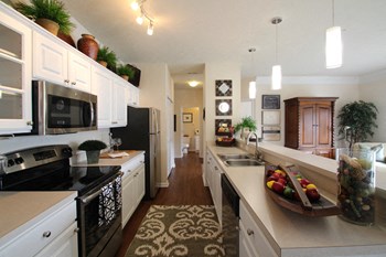 The Islander This is a photo of the kitchen in the 2 bedroom Islander floor plan at Nantucket Apartments in Loveland, OH. - Photo Gallery 2
