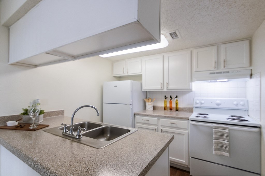 kitchen and hallway from the dining room  at Princeton Court, Texas