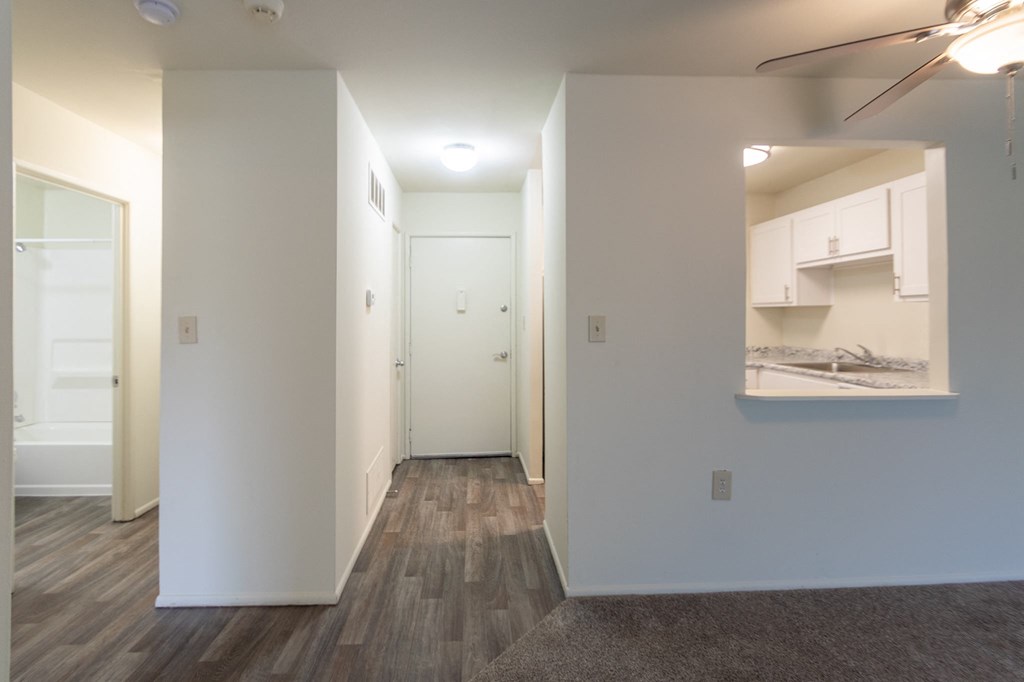 This is a photo of a large kitchen pass through and the entryway in a 560 square foot 1, 1 bath apartment at Park Lane Apartments in Cincinnati, OH.