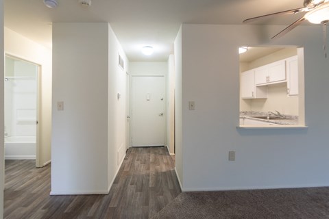 This is a photo of a large kitchen pass through and the entryway in a 560 square foot 1, 1 bath apartment at Park Lane Apartments in Cincinnati, OH.