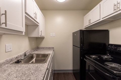 This is a photo of the kitchen in a 849 square foot split 2 bedroom, 2 bath apartment at Park Lane Apartments in Cincinnati, OH.