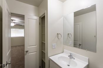 This is a photo of the primary bathroom linen closet in a 849 square foot split 2 bedroom, 2 bath apartment at Park Lane Apartments in Cincinnati, OH.