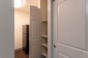 This is a photo of the kitchen pantry in a 849 square foot split 2 bedroom, 2 bath apartment at Park Lane Apartments in Cincinnati, OH.