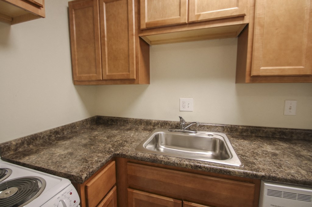 This is a photo of the living room in a 750 square foot 2 bedroom, 1 bath apartment at Park Lane Apartments in Cincinnati, OH.