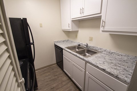 This is a photo of the kitchen in a 849 square foot 2 bedroom, 2 bath apartment at Park Lane Apartments in Cincinnati, OH.