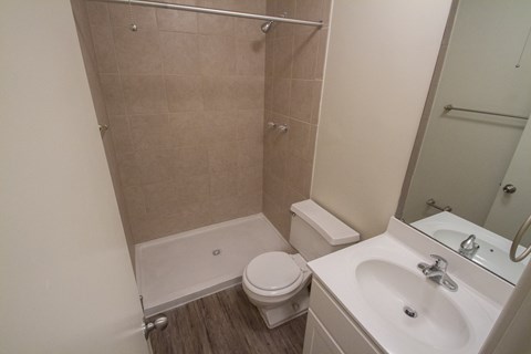 This is a photo of the bathroom with stand up shower in a 849 square foot 2 bedroom, 2 bath apartment at Park Lane Apartments in Cincinnati, OH.