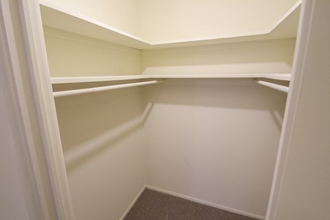 This is a photo of the hallway showing the linen closet in a 750 square foot 2 bedroom, 1 bath apartment at Park Lane Apartments in Cincinnati, OH.