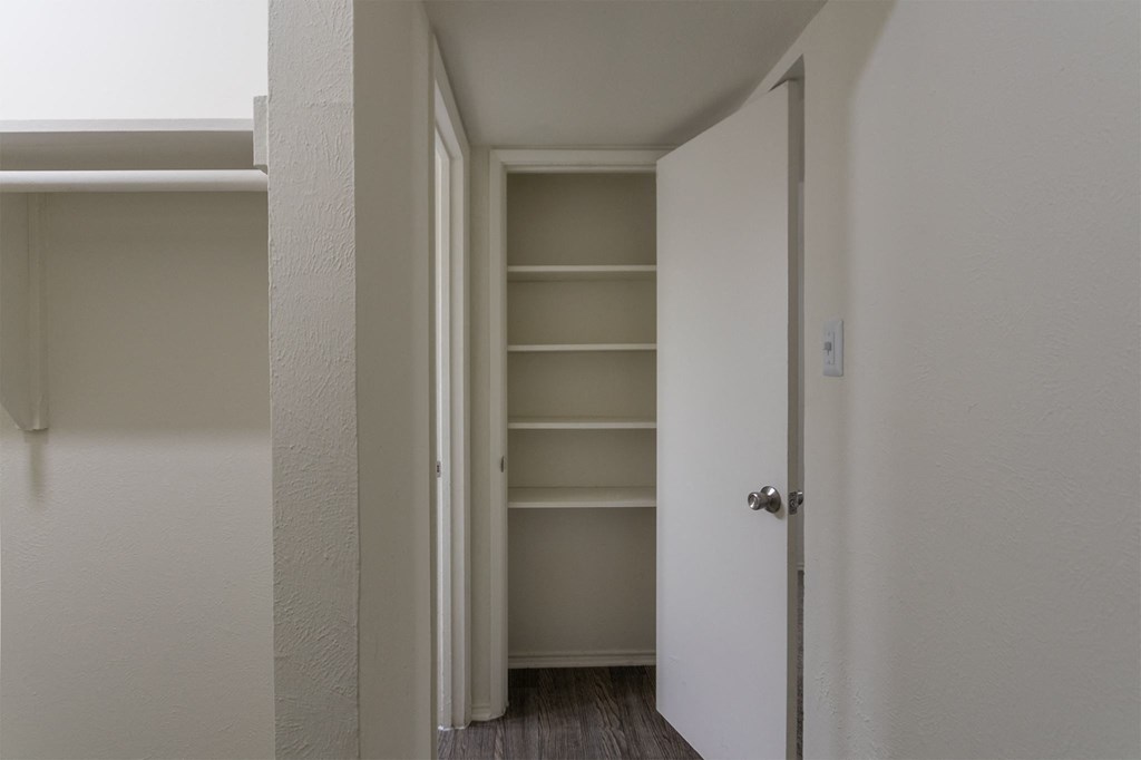 bathroom and walk-in closet area at Preston Park Apartments, Dallas, Texas