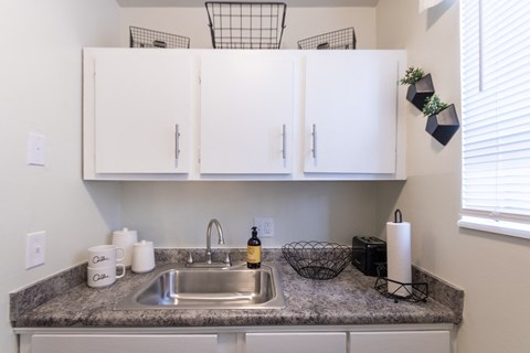 This is a picture of the kitchen in a 576 sq foot 1 bedroom, 1 bath apartment at Red Bank Reserve in the Madisonville neighborhood of Cincinnati, Ohio.