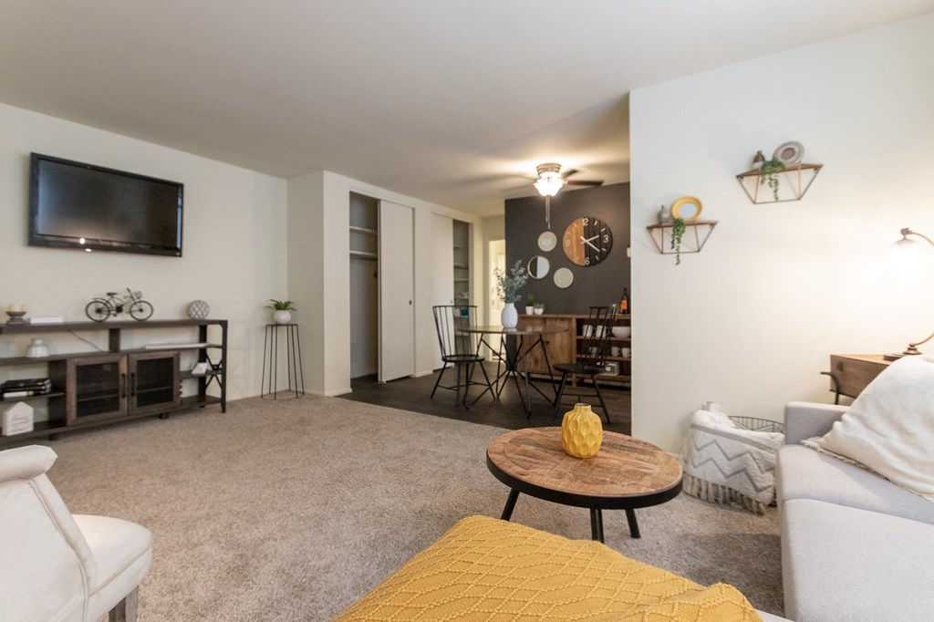 This is a picture of the living room and dining area in a 576 sq foot 1 bedroom, 1 bath apartment at Red Bank Reserve in the Madisonville neighborhood of Cincinnati, Ohio.