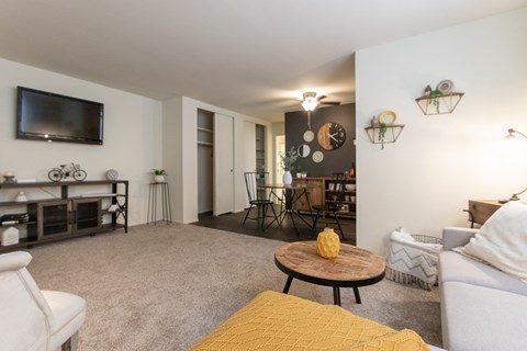 This is a picture of the living room and dining area in a 576 sq foot 1 bedroom, 1 bath apartment at Red Bank Reserve in the Madisonville neighborhood of Cincinnati, Ohio.