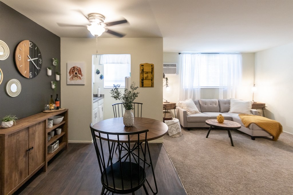 This is a picture of the dining area and living room in a 576 sq foot 1 bedroom, 1 bath apartment at Red Bank Reserve in the Madisonville neighborhood of Cincinnati, Ohio.