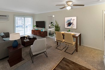 This is a photo of the digitally staged living room of a 742 square foot, 2 bedroom apartment at Romaine Court Apartments in the Oakley neighborhood of Cincinnati, Ohio. - Photo Gallery 10