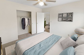 This is a photo of the digitally staged second bedroom of a 742 square foot, 2 bedroom apartment at Romaine Court Apartments in the Oakley neighborhood of Cincinnati, Ohio. - Photo Gallery 13