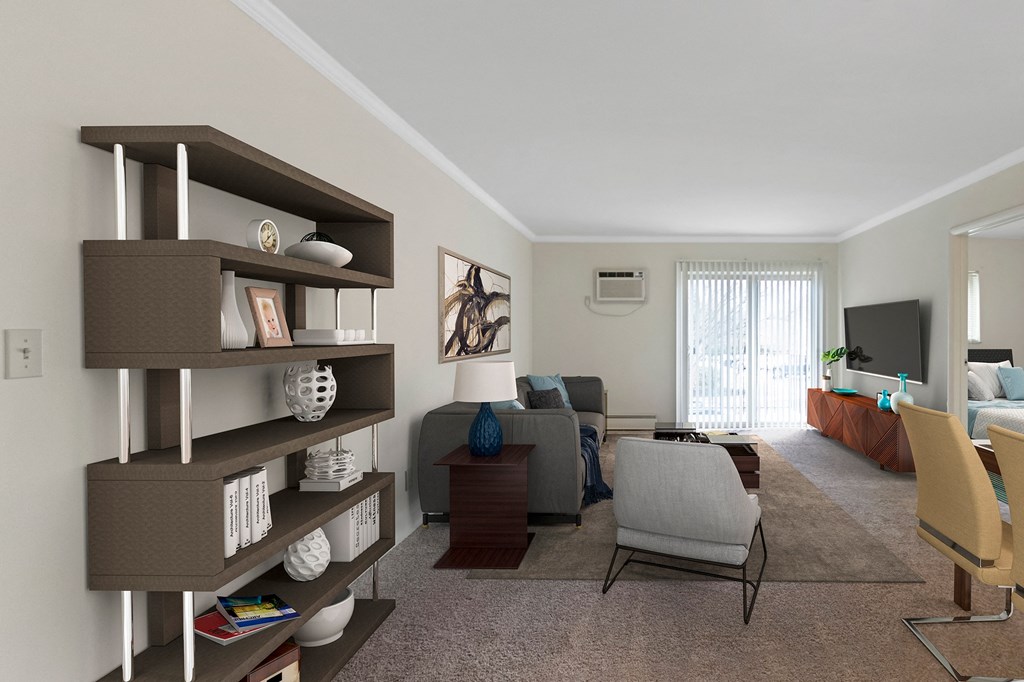 This is a photo of the digitally staged living room of a 742 square foot, 2 bedroom apartment at Romaine Court Apartments in the Oakley neighborhood of Cincinnati, Ohio.