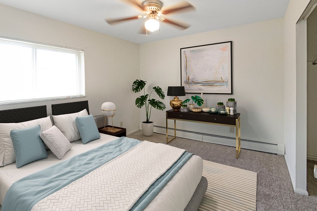 This is a photo of the digitally staged second bedroom of a 742 square foot, 2 bedroom apartment at Romaine Court Apartments in the Oakley neighborhood of Cincinnati, Ohio.