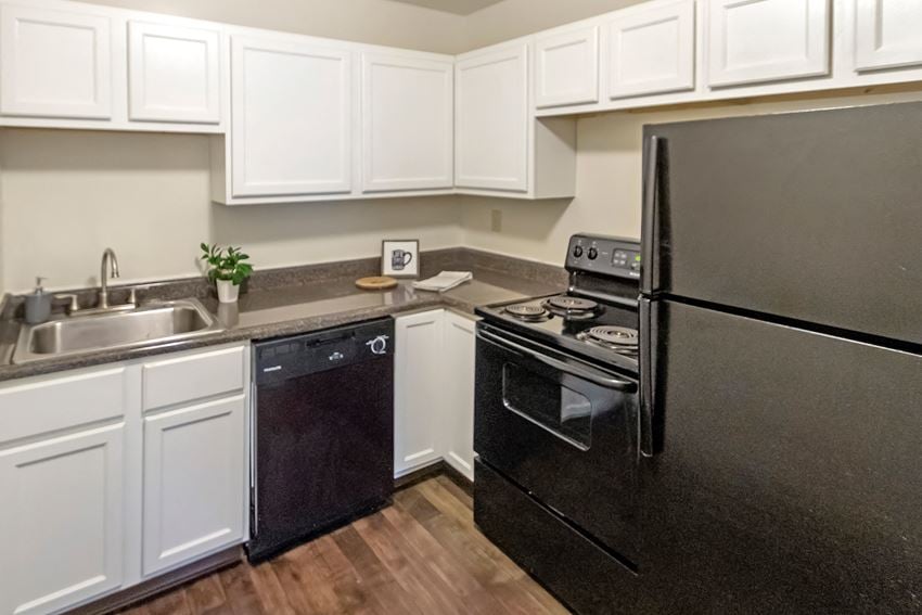 This is a photo of the kitchen of a 742 square foot, 2 bedroom apartment at Romaine Court Apartments in the Oakley neighborhood of Cincinnati, Ohio. - Photo Gallery 1