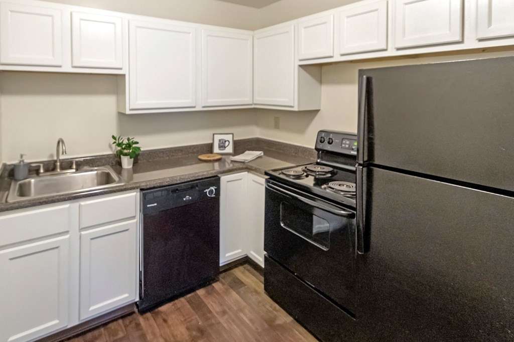 This is a photo of the kitchen of a 742 square foot, 2 bedroom apartment at Romaine Court Apartments in the Oakley neighborhood of Cincinnati, Ohio.