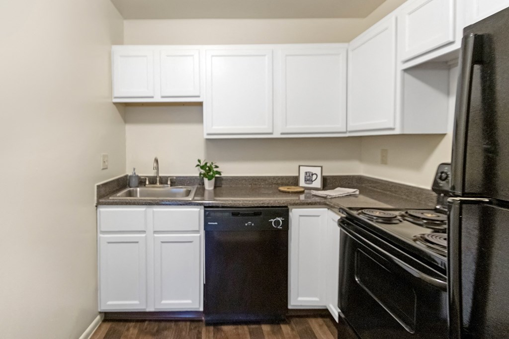 This is a photo of the kitchen of a 742 square foot, 2 bedroom apartment at Romaine Court Apartments in the Oakley neighborhood of Cincinnati, Ohio.