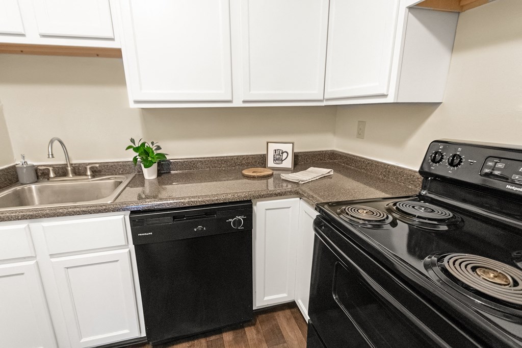 This is a photo of the kitchen of a 742 square foot, 2 bedroom apartment at Romaine Court Apartments in the Oakley neighborhood of Cincinnati, Ohio.