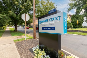 This is a photo of the entrance sign at Romaine Court Apartments in the Oakley neighborhood of Cincinnati, Ohio. - Photo Gallery 36