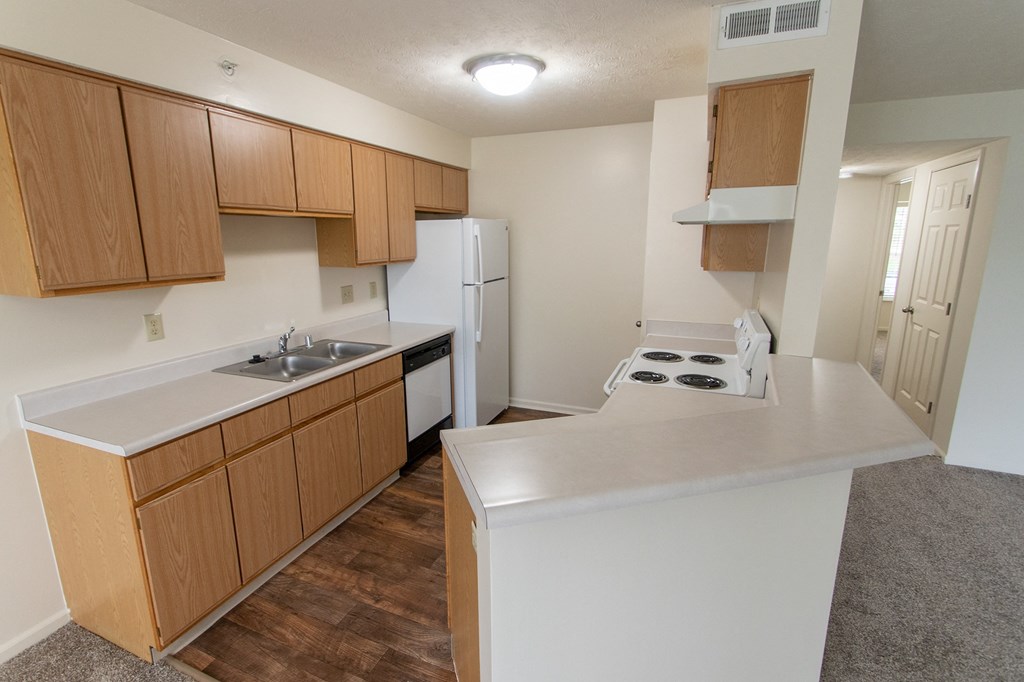 This is photo of the kitchen in the 852 square foot, 1 bedroom Fairlawn floor plan at Trails of Saddlebrook Apartments in Florence, KY.