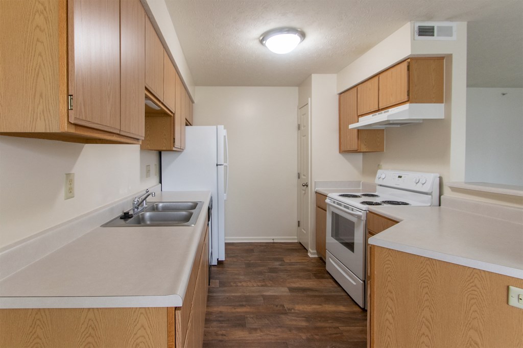This is photo of the kitchen in the 852 square foot, 1 bedroom Fairlawn floor plan at Trails of Saddlebrook Apartments in Florence, KY.