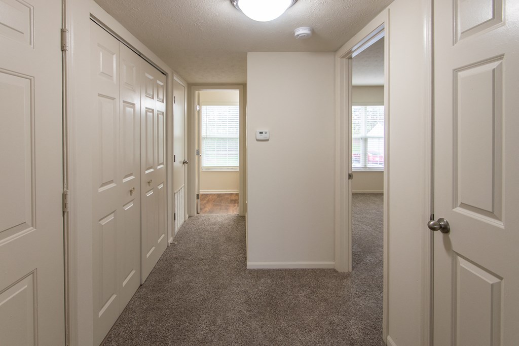 This is photo of the entryway looking towards the bathroom in the 852 square foot, 1 bedroom Fairlawn floor plan at Trails of Saddlebrook Apartments in Florence, KY.