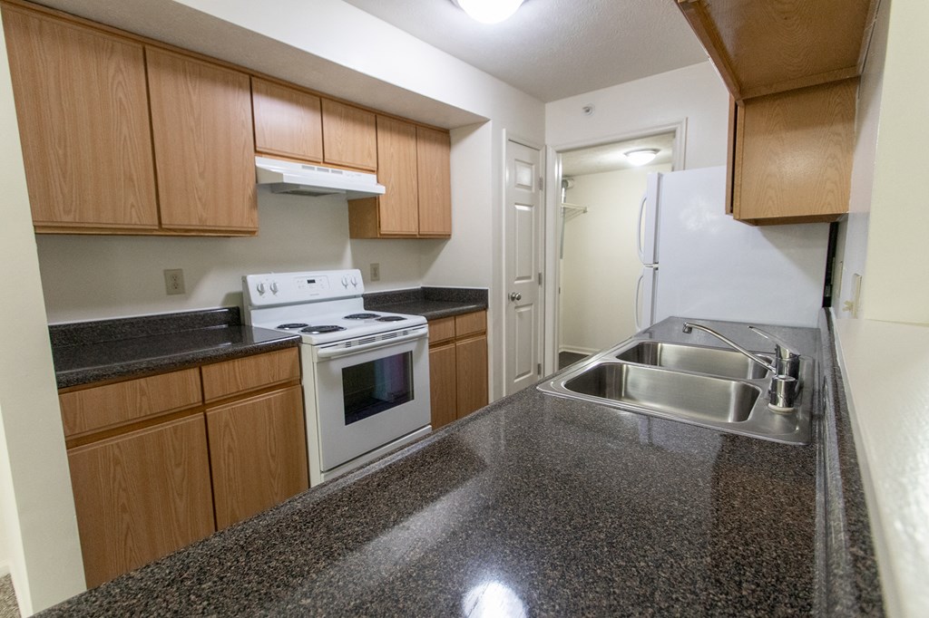 This is photo of the kitchen in the 1056 square foot, 2 bedroom Gainsway floor plan at Trails of Saddlebrook Apartments in Florence, KY.